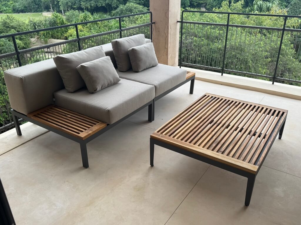 Teak and aluminum outdoor seating on terrace